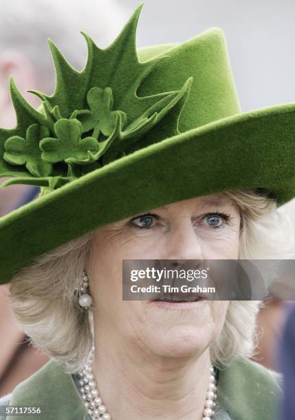 Camilla, Duchess of Cornwall wears a St Patrick's Day themed hat decorated with shamrocks, designed by Milliner Philip Treacy to the final day of...