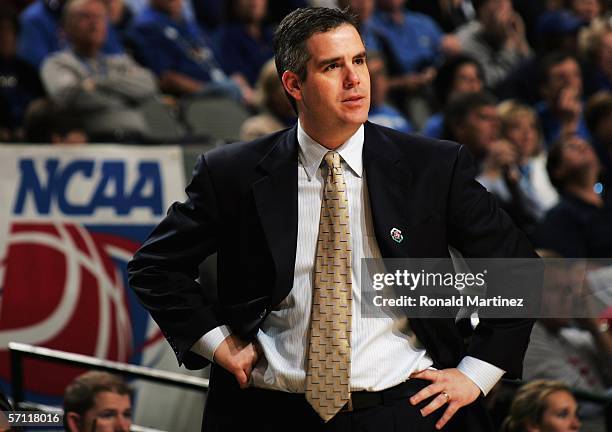 Head coach Scott Sutton of the Oral Roberts Golden Eagles watches his team during the First Round game against the Memphis Tigers in the 2006 NCAA...