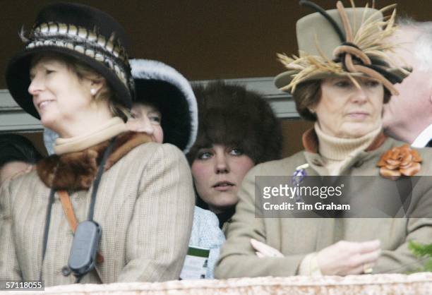 Prince William's girlfriend, Kate Middleton discreetly stands at the back of the royal box to watch the Cheltenham Races on March 17, 2006 in...