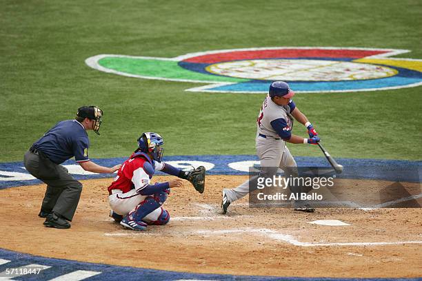 Olmedo Saenz of Panama swings at the pitch during the game against Cuba during the World Baseball Classic at Hiram Bithorn Stadium on March 8, 2006...