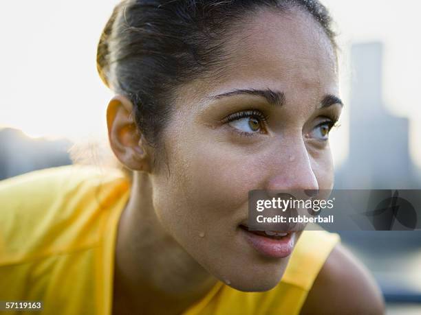 close-up of a woman looking away - extra long stock pictures, royalty-free photos & images