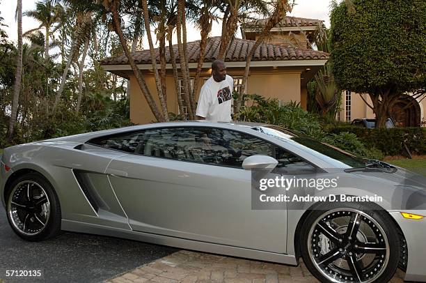 Shaquille O'Neal stands next to his Lamborghini at his home on March 6, 2006 in Star Island, Florida. NOTE TO USER: User expressly acknowledges and...