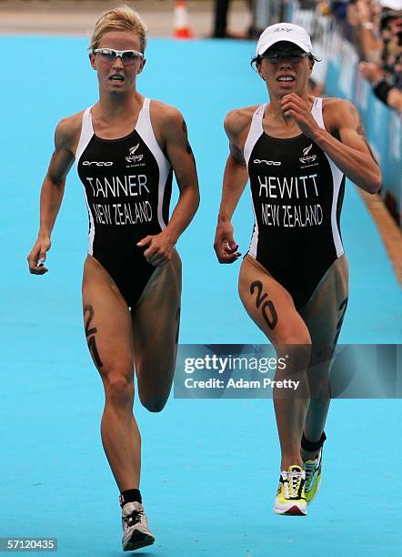 Debbie Tanner and Andrea Hewitt of New Zealand sprint to the finish line during the Run section of the Triathlon Women's Race at the St Kilda...
