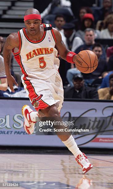 Josh Smith of the Atlanta Hawks drives against the Utah Jazz during a game on March 17, 2006 at Philips Arena in Atlanta, Georgia. NOTE TO USER: User...