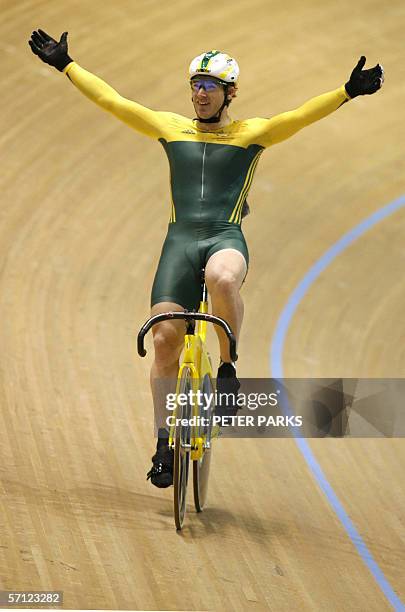 Australia's Ryan Bayley celebrates his win over Scotland's Edgar Ross in the men's sprint cycling final at the Commonwealth Games in Melbourne, 18...