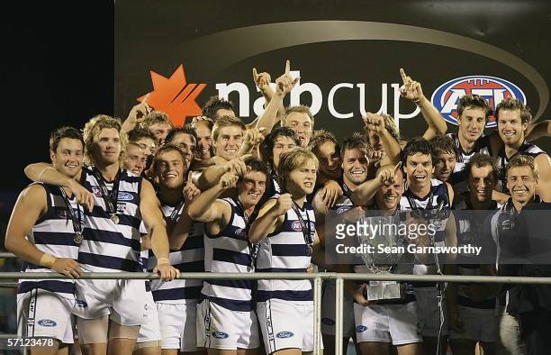 The Geelong team celebrate after winning the NAB Cup Grand Final between the Adelaide Crows and Geelong Cats at Adelaide Oval March 18, 2006 in...