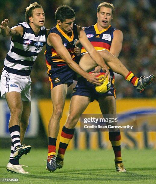 Henry Playfair for Geelong and Nathan Bassett for Adelaide in action during the NAB Cup Grand Final between the Adelaide Crows and Geelong Cats at...