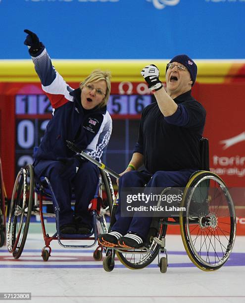 Angie Malone and Great Britian team mate Michael McCreadie celebrate a point during the Wheelchair Curling Final between Great Britain and Canada...
