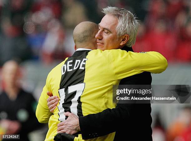 Deus Santos Dede of Dortmund, celebrates scoring the first goal with his coach Bert van Marwijk during the Bundesliga match between Borussia Dortmund...