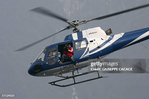 Cameraman is seen on boad of an helicopther flying over Cernobbio, 18 March 2006. US film stars Brad Pitt and Angelina Jolie are rumored to be...