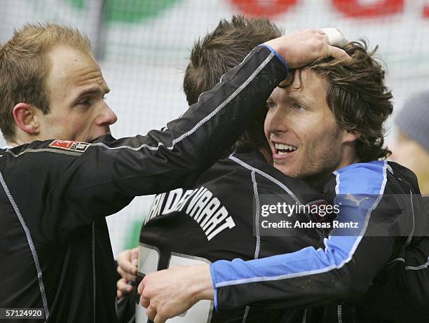 Benjamin Lauth of Hamburg celebrates with David Jarolim after Hamburg's first goal during the Bundesliga match between VFL Wolfsburg and Hamburger SV...