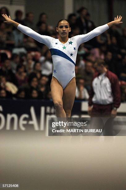 Brazil's Lais Souza performs during the floor exercise qualifying round, 18 March 2006 in Lyon, central eastern France, during the 15th International...