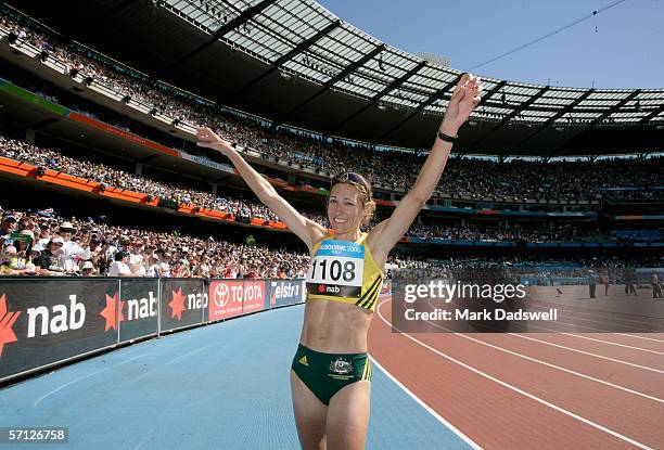 Kerryn McCann of Australia celebrates winning the final of the women's marathon at the athletics during day four of the Melbourne 2006 Commonwealth...