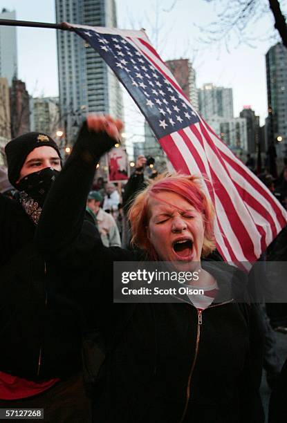 Protestor shouts during an anti-war demonstration marking the third anniversary of the invasion of Iraq March 18, 2006 in Chicago, Illinois. Several...