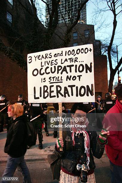 Protestor prepares to march in an anti-war demonstration marking the third anniversary of the invasion of Iraq March 18, 2006 in Chicago, Illinois....