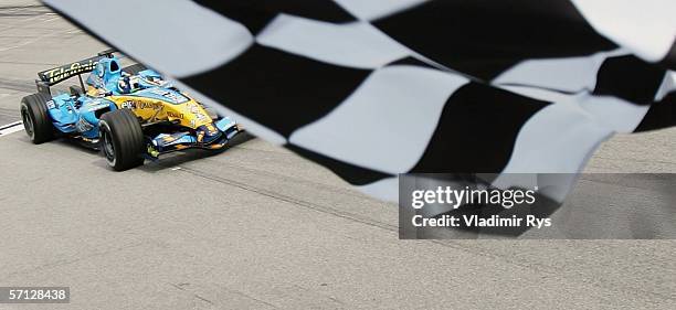 Giancarlo Fisichella of Italy and Renault drives over the finish line during the Malaysian Formula One Grand Prix on March 19 in Kuala Lumpur,...