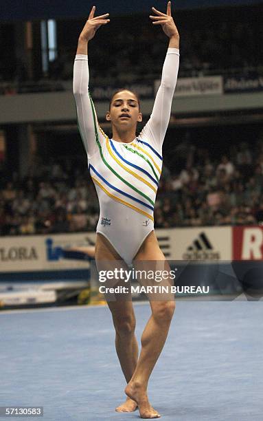 Brazil's Lais Souza performs during the floor exercise final round, 19 March 2006 in Lyon, central eastern France, during the 15th International...
