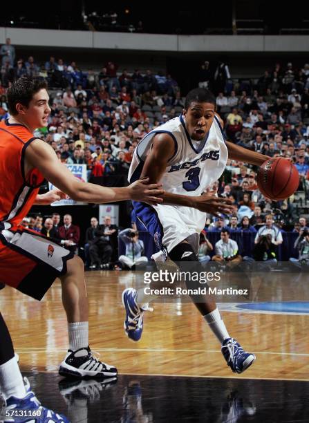 Chris Douglas-Roberts of the Memphis Tigers drives the ball past Darren Mastropaolo of the Bucknell Bison during the Second Round game of the 2006...
