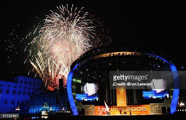 Fireworks explode above the stage during the closing ceremony of the Turin 2006 Winter Paralympic Games held at the Medal Plaza on March 19, 2006 in...