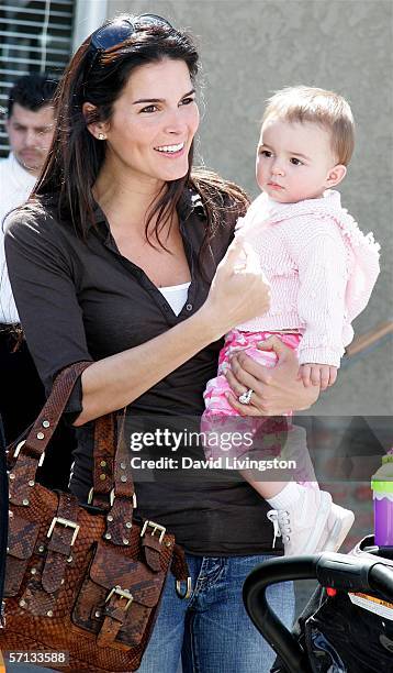 Actress Angie Harmon with one of her daughters attends the John Varvatos 4th Annual Stuart House Benefit at the John Varvatos Boutique on March 19,...