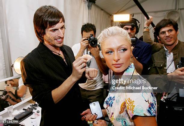 Socialite Paris Hilton backstage at the Louis Verdad Fall 2006 show during Mercedes-Benz Fashion Week at Smashbox Studios on March 19, 2006 in Culver...