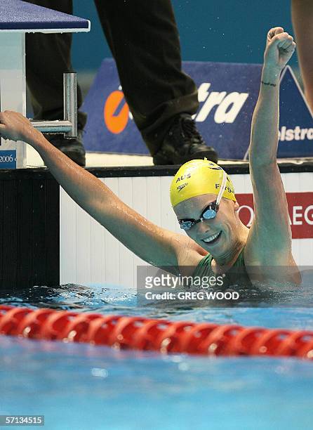 Joanna Fargus of Australia celebrates her victory in the women's 200-metres backstroke final at the Commonwealth Games in Melbourne, 20 March 2006....