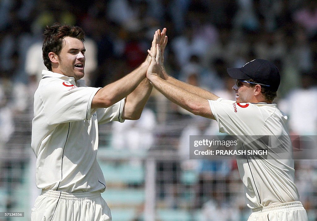 England cricketer James Anderson (L) is