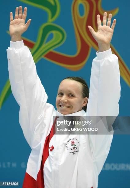 Melanie Marshall of England waves on the podium following her silver medal performance in the women's 200-metres backstroke final at the Commonwealth...