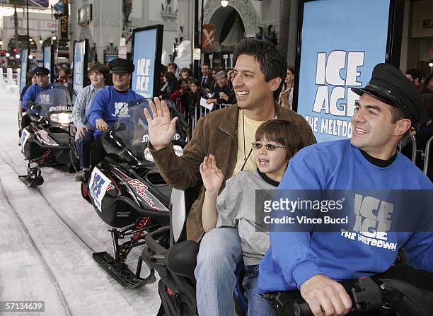 Actor Ray Romano and son Joseph arrive on a snow mobile outside the Mann's Grauman Chinese Theatre at the world premiere of the Twentieth Century Fox...