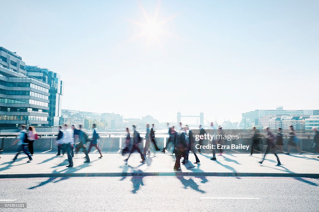 Workers walking to work through the city.