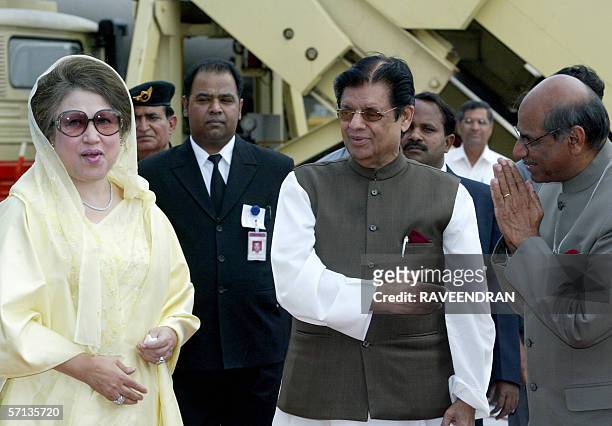 Bangladesh Prime Minister Begum Khaleda Zia is welcomed by Indian Minister of State for External Affairs E. Ahmed and Indian Foreign Secretary Shyam...