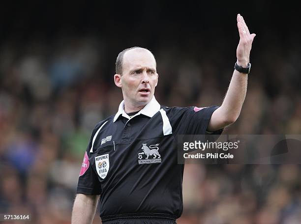 Referee Mike Dean looks on during the Barclays Premiership match between Fulham and Chelsea at Craven Cottage on March 19, 2006 in London, England.