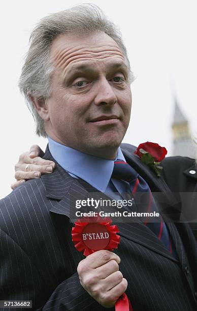 Actor Rik Mayall pose's as his comic 1980's TV character Alan B'Stard to launch the four-month UK tour of the stage adaptation of the satirical TV...