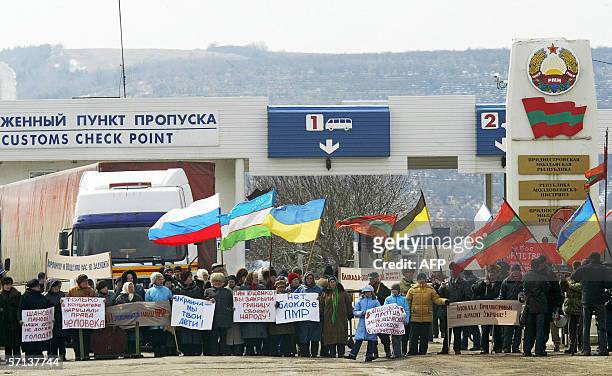 Local inhabitants of the Moldova's separatist province of Transdniestr protest on the border with Ukrainian at the ?Platonovo? crossing point in the...