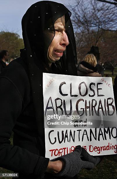 Peace activist Betty Katz Sperlich of Santa Fe, New Mexico, weaps during an anti-war rally near the National Mall before marching to the Pentagon...