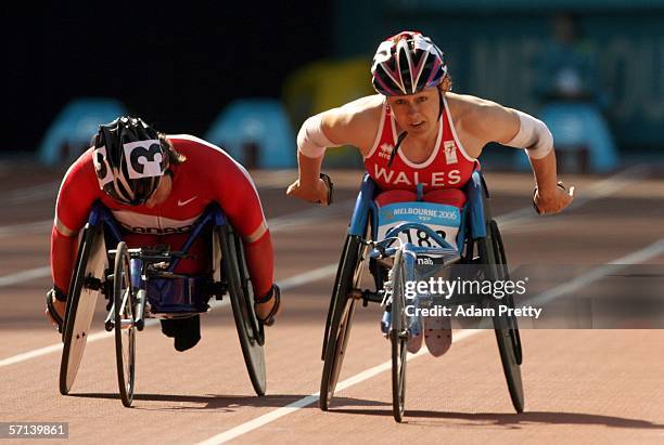 Theresa Ferguson of Canada and Tanni Grey of Wales compete during the women's 800m disabled race at the athletics during day six of the Melbourne...