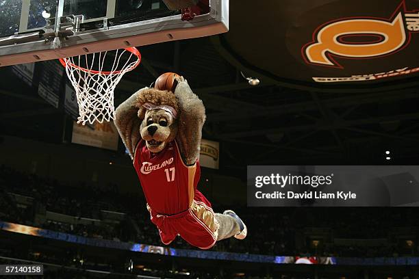 MoonDog, the mascot of the Cleveland Cavaliers, performs a power dunk during a game between the Orlando Magic and the Cleveland Cavaliers at Quicken...