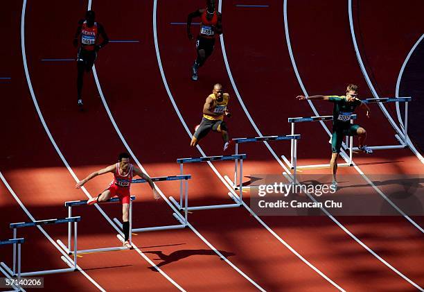 Brendan Cole of Australia competes in the heats of the men's 400m Hurdles at the athletics during day six of the Melbourne 2006 Commonwealth Games at...