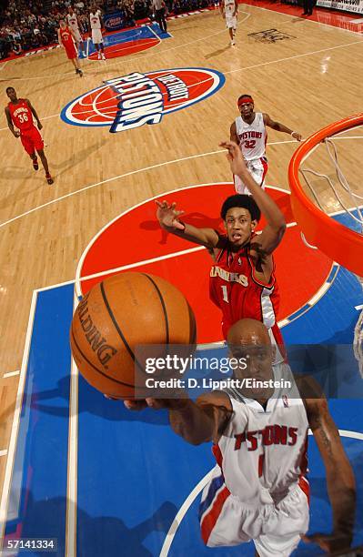 Chauncey Billups of the Detroit Pistons goes up for a layup against Josh Childress of the Atlanta Hawks in NBA action March 20, 2006 at the Palace of...