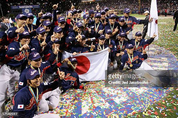 Members of Team Japan celebrate after defeating Team Cuba in the Final game of the World Baseball Classic at Petco Park on March 20, 2006 in San...