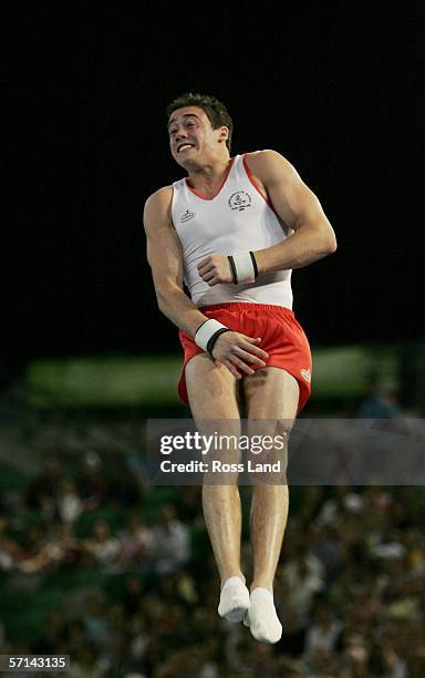 Kristian Thomas of England competes in the Men's Vault Final in the artistic gymnastics at the Rod Laver Arena during day six of the Melbourne 2006...