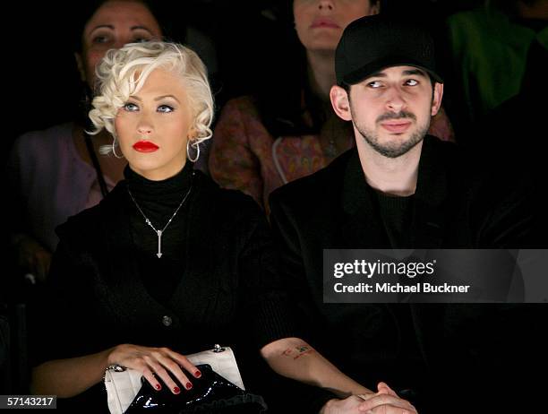 Singer Christina Aguilera and husband Jordan Bratman in the front row at the Agent Provocateur Fall 2006 show during Mercedes-Benz Fashion Week at...