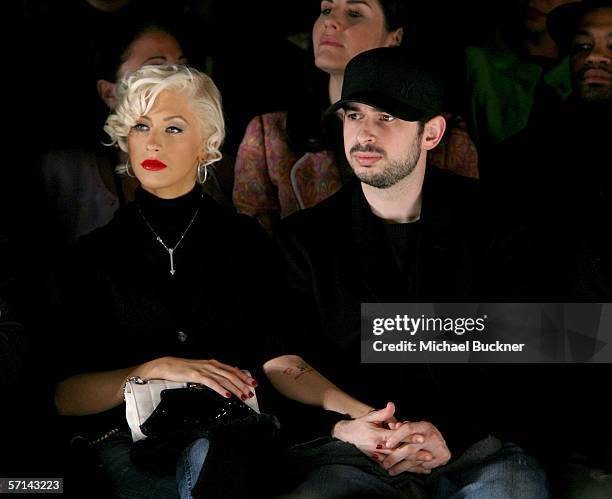 Singer Christina Aguilera and husband Jordan Bratman in the front row at the Agent Provocateur Fall 2006 show during Mercedes-Benz Fashion Week at...