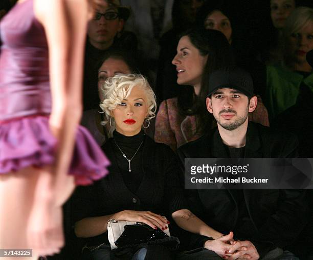Singer Christina Aguilera and husband Jordan Bratman in the front row at the Agent Provocateur Fall 2006 show during Mercedes-Benz Fashion Week at...
