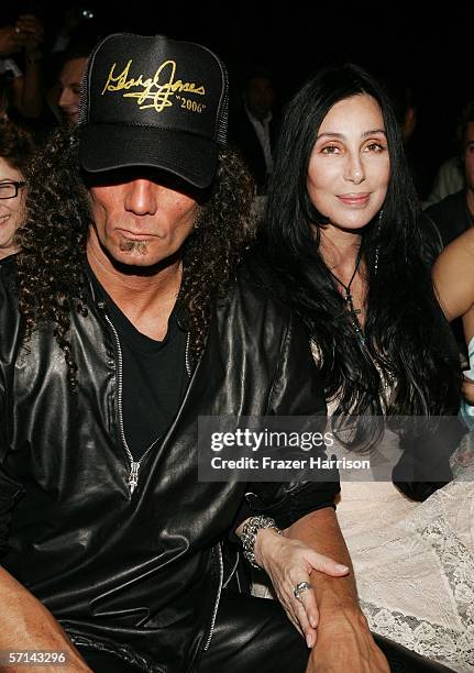 Singer Cher and guest in the front row at the Agent Provocateur Fall 2006 show during Mercedes-Benz Fashion Week at Smashbox Studios on March 20,...