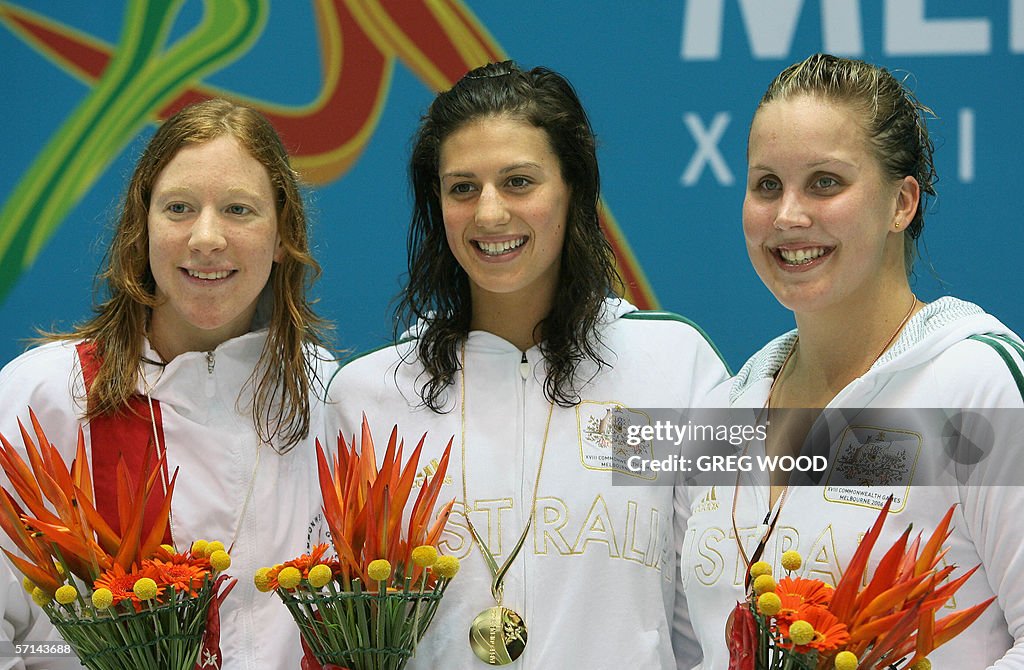 Gold medallist Stephanie Rice (C) of Aus