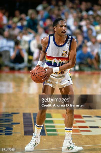 Alex English of the Denver Nuggets looks to pass during the NBA game at the McNichols Sports Arena circa 1986 in Denver, Colorado. NOTE TO USER: User...