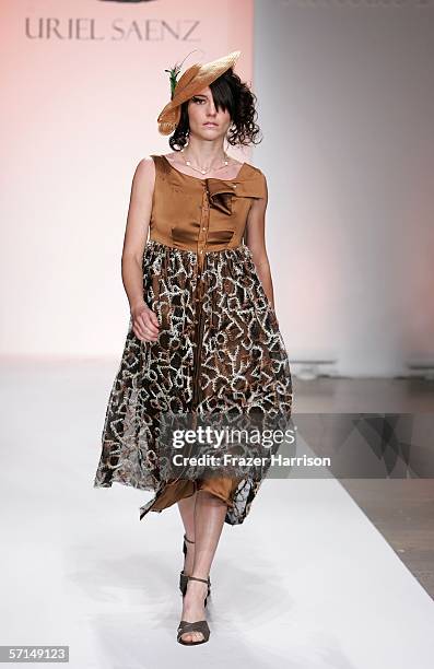 Model walks the runway at the Uriel Saenz Fall 2006 show during the Mercedes Benz Fashion Week at Smashbox Studios on March 21, 2006 in Culver City,...