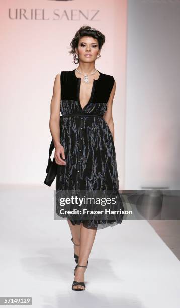 Model walks the runway at the Uriel Saenz Fall 2006 show during the Mercedes Benz Fashion Week at Smashbox Studios on March 21, 2006 in Culver City,...