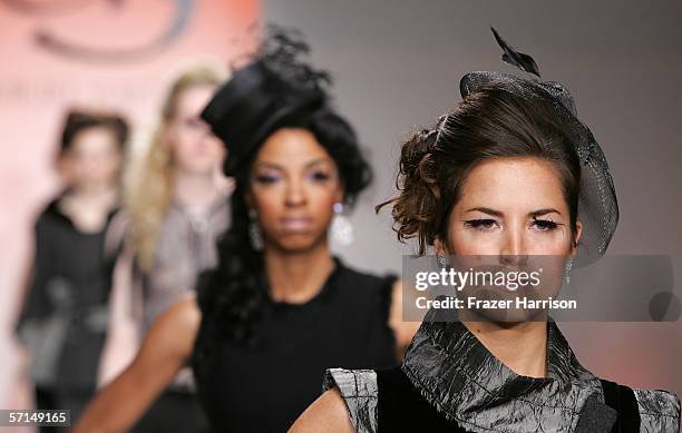 Models walk the runway at the Uriel Saenz Fall 2006 show during the Mercedes Benz Fashion Week at Smashbox Studios on March 21, 2006 in Culver City,...